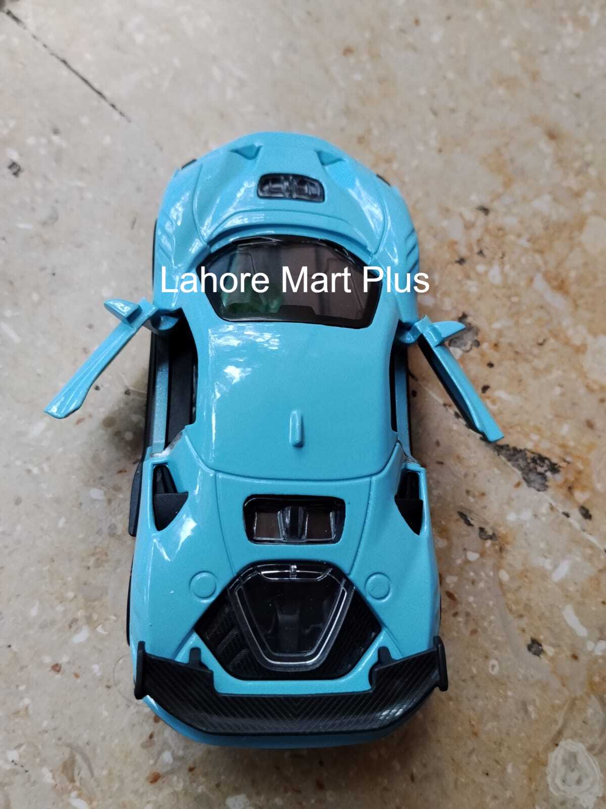 Blue metal toy sports car rear view