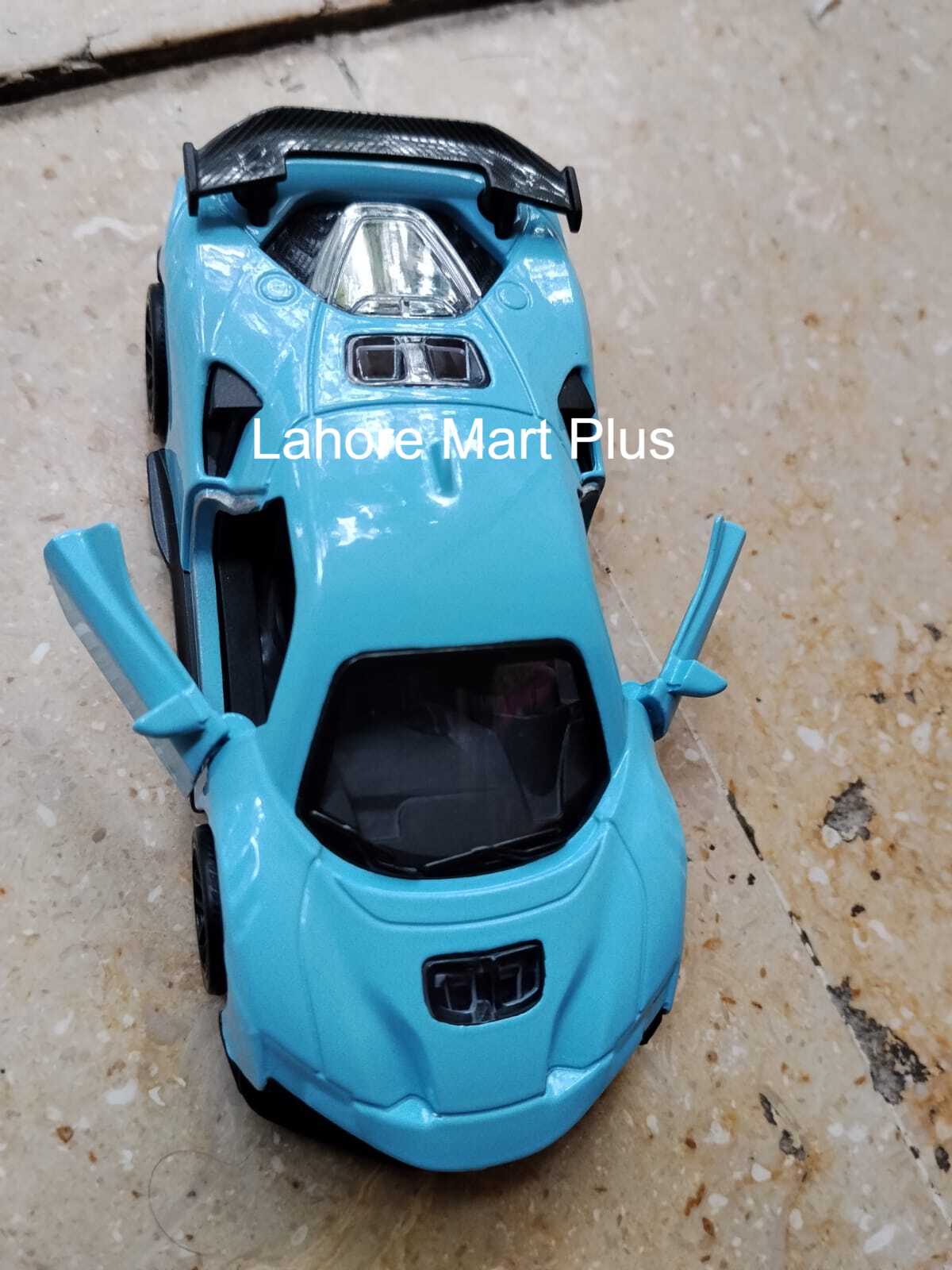 Blue metal toy sports car front view