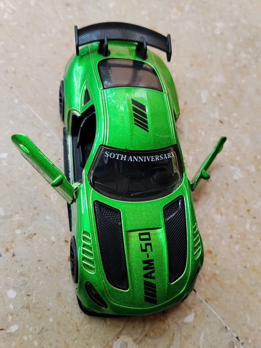 Green die-cast metal sports car with opening front doors